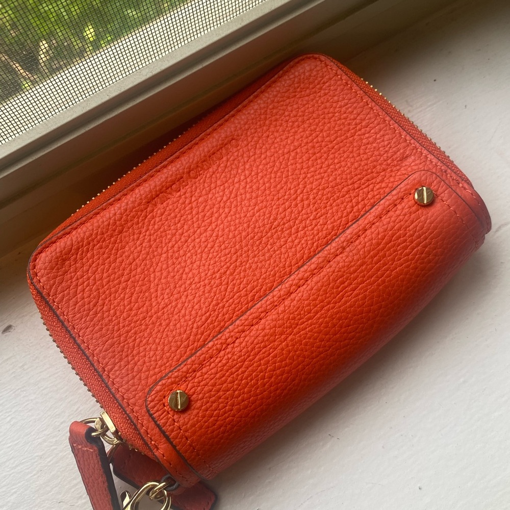 Vince Camuto orange wristlet wallet